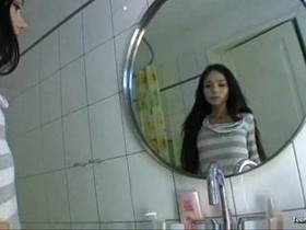 Beautiful teenager in the bathroom